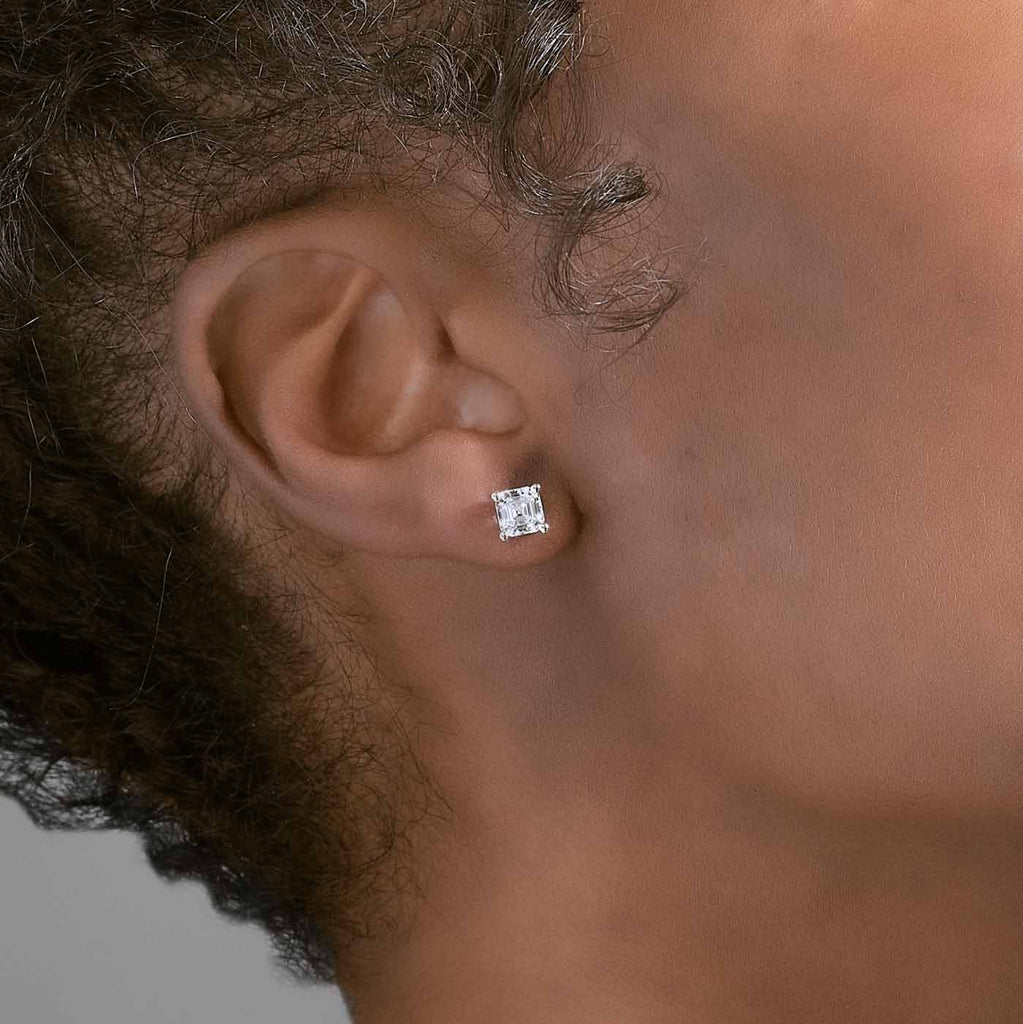 Model wearing Jewellers District's Asscher-Cut Diamond Stud Earrings in 14k White Gold, Lab-grown 1.40 ctw, VS2+/ F+ #4