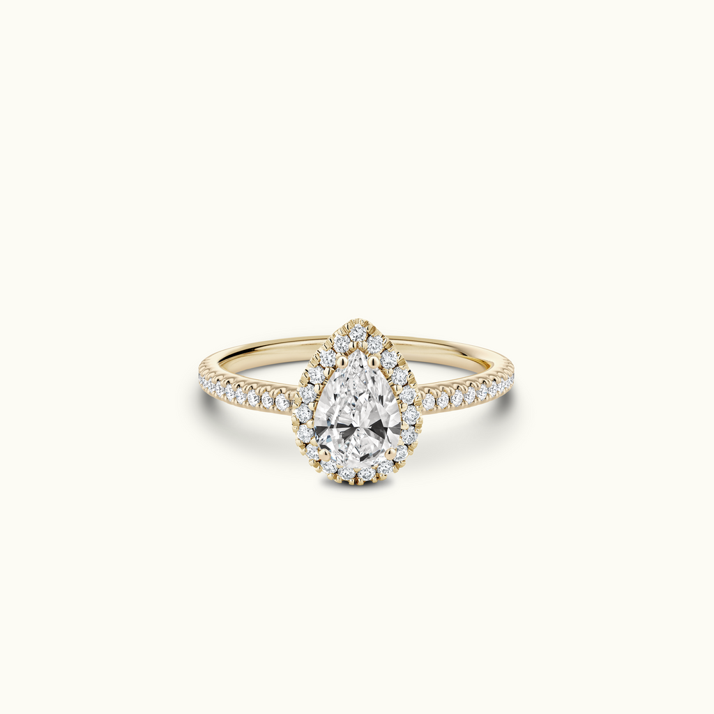 Jewellers District's Diamond Halo Engagement Ring in 14k Yellow Gold, Pear