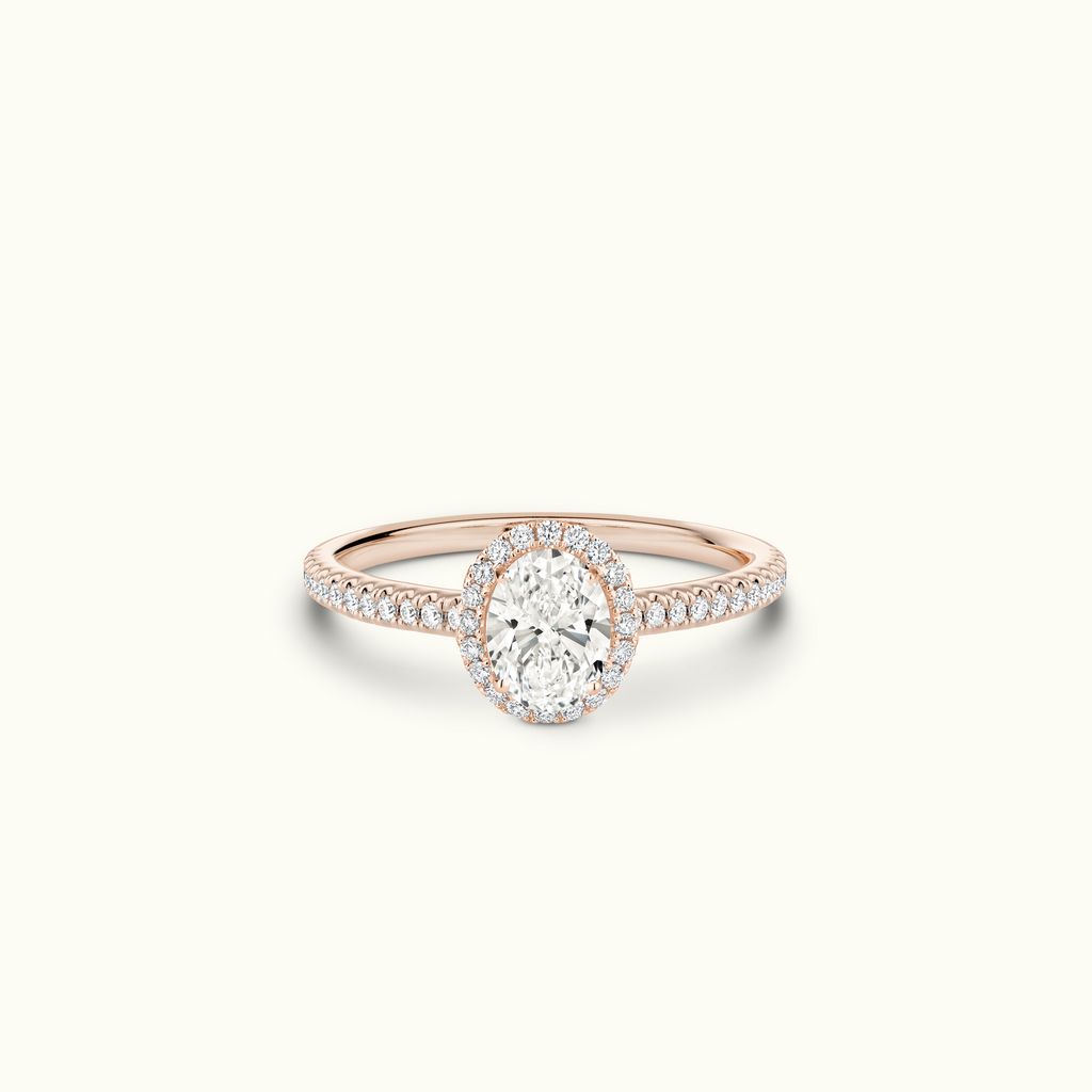 Jewellers District's Diamond Halo Engagement Ring in 14k Rose Gold, Oval