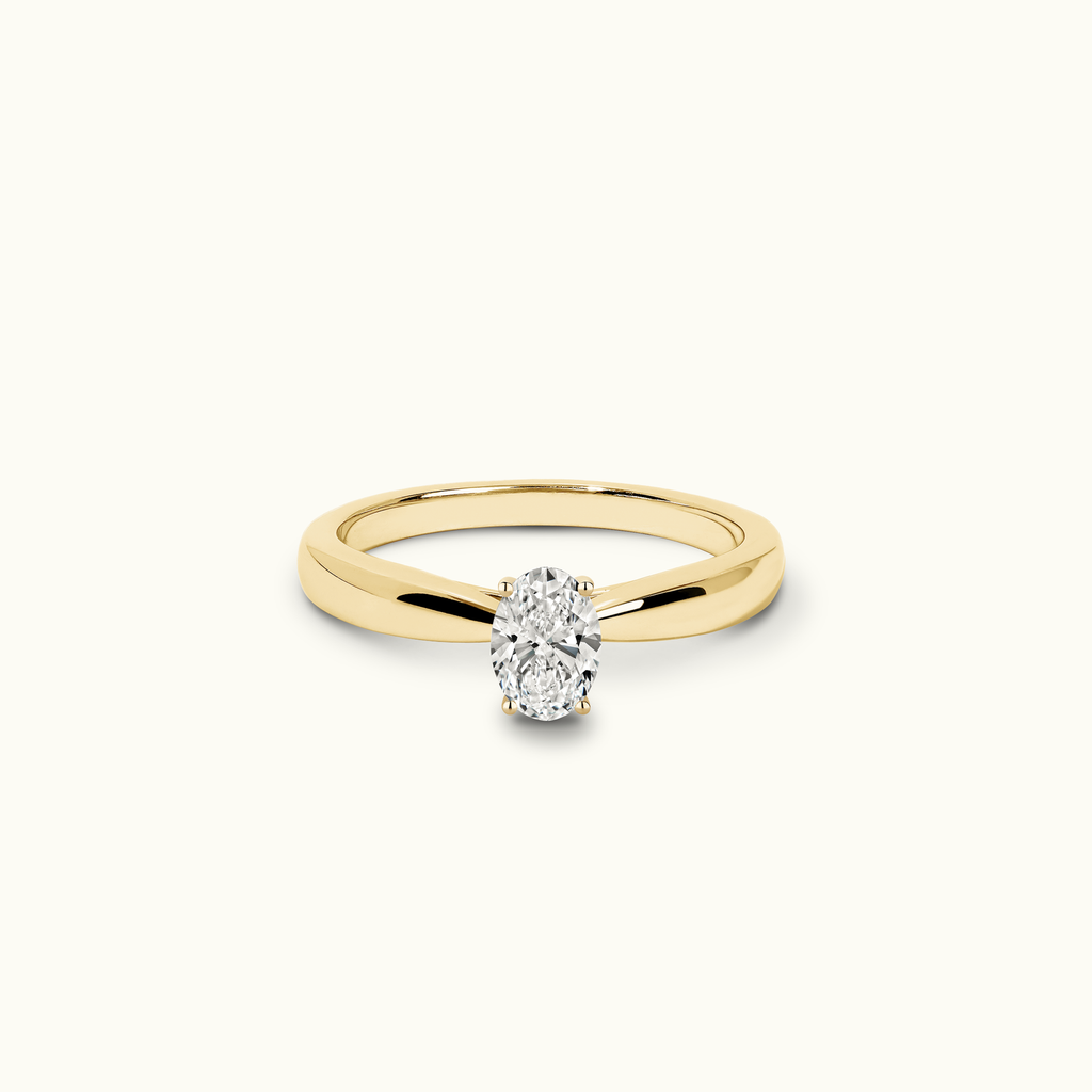 Jewellers District's Diamond Engagement Ring with Tapered Thick Band in 14k Yellow Gold, Oval