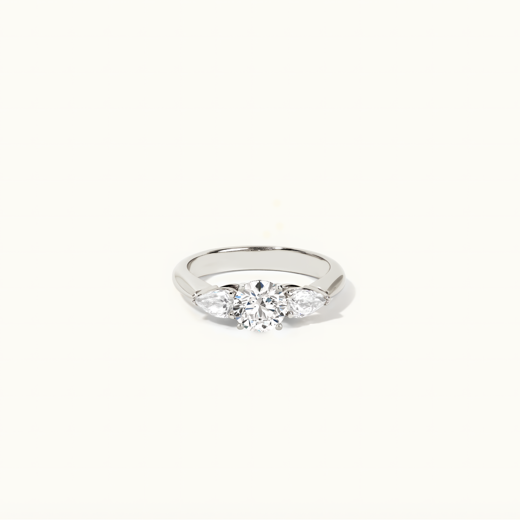 Jewellers District's Three-Stone Diamond Engagement Ring with Side Pear Diamonds in 14k White Gold, Round