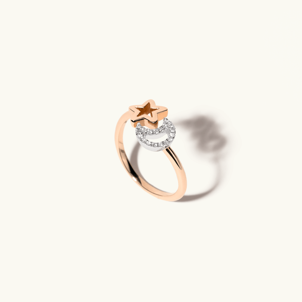 Angled view of Jewellers District's Moon and Star Wrap Around Ring with Accent Diamonds in 14k Rose Gold