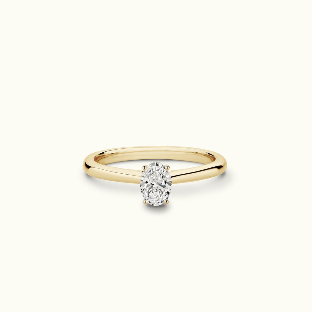 Jewellers District's Solitaire Diamond Engagement Ring with Cathedral-Setting in 14k Yellow Gold, Oval