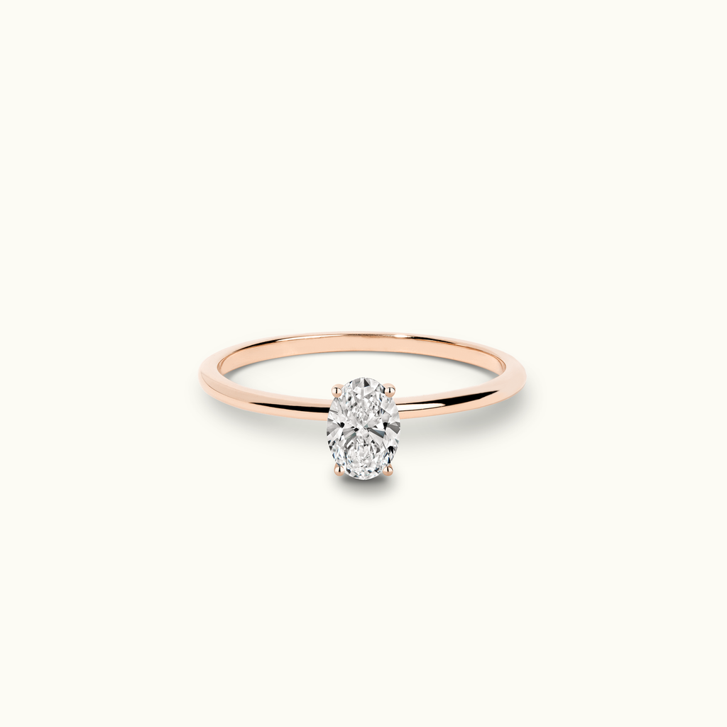 Jewellers District's Solitaire Diamond Engagement Ring with X Setting in 14k Rose Gold, Oval