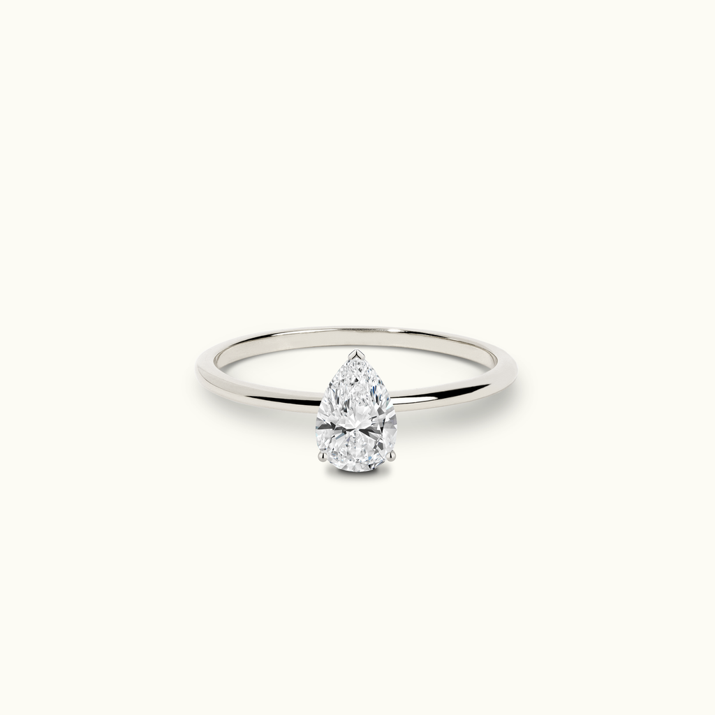 Jewellers District's Solitaire Diamond Engagement Ring with X Setting in 14k White Gold, Pear