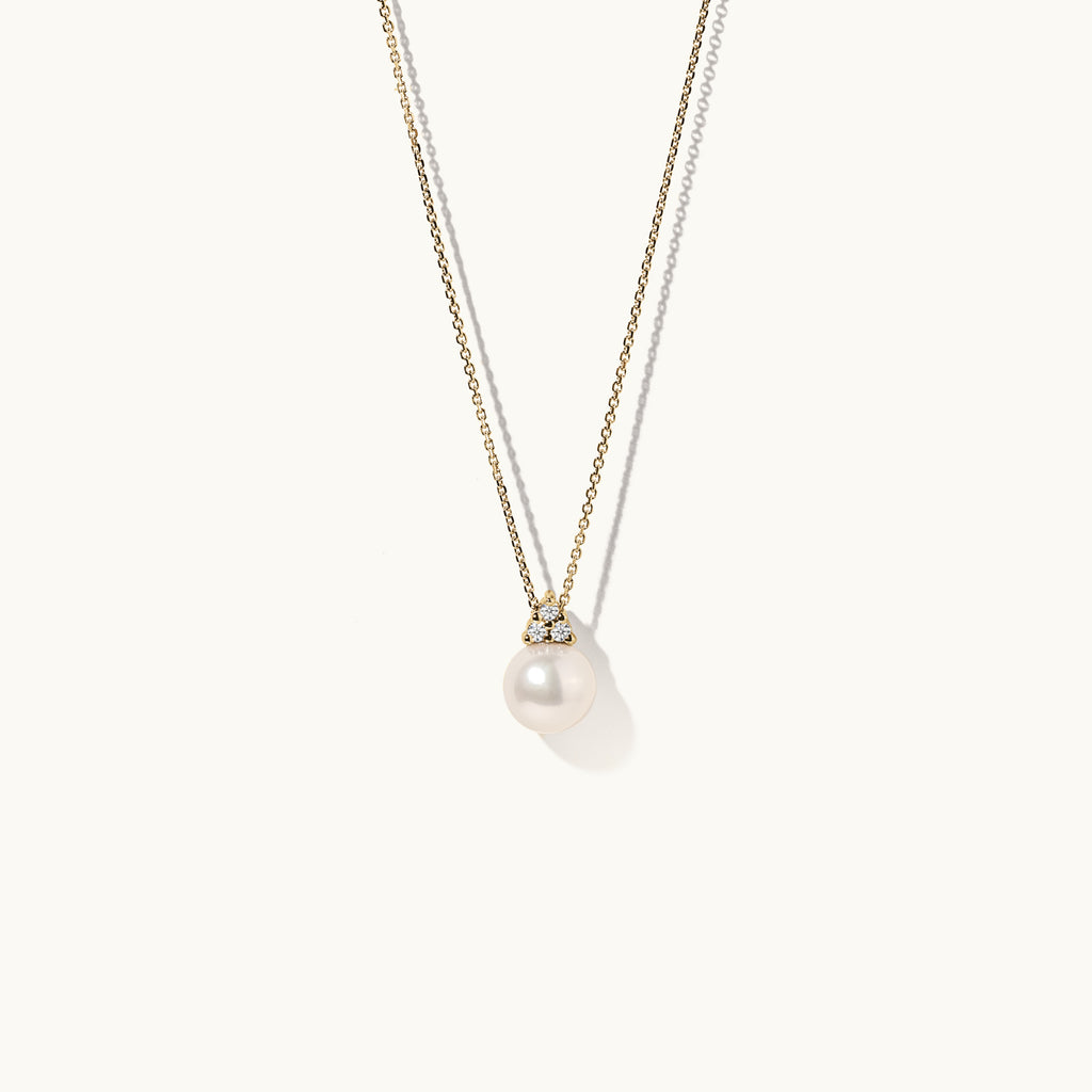 Face view of Jewellers District's Freshwater Pearl Pendant Necklace with Accent Diamonds in 14k Yellow Gold