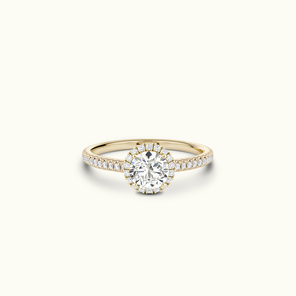 Jewellers District's Diamond Halo Engagement Ring in 14k Yellow Gold, Round