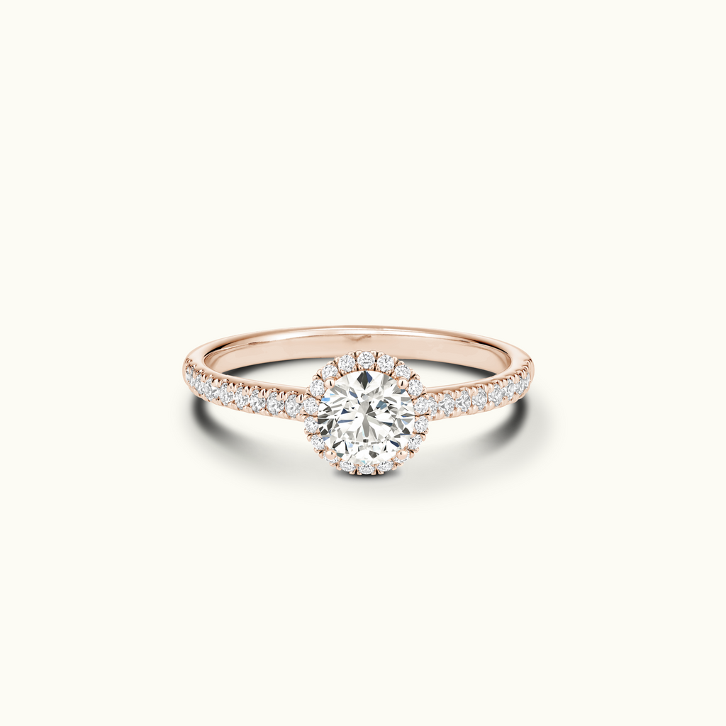 Jewellers District's Diamond Halo Engagement Ring with Diamond Bridge in 14k Rose Gold, Round