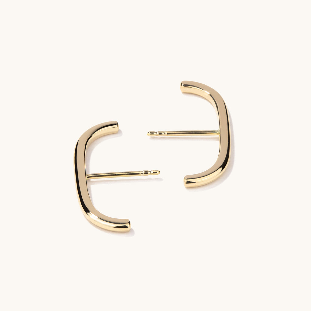 Face view of Jewellers District's Earlobe Cuff Gold Earrings in 14k Yellow Gold