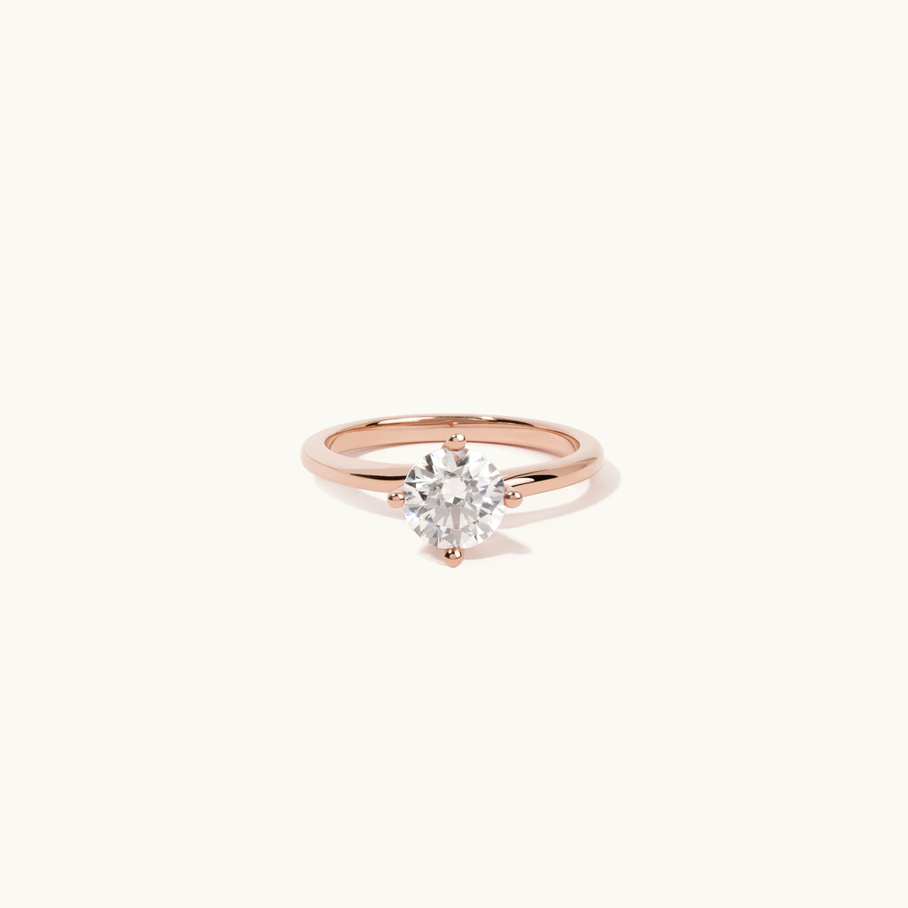 Jewellers District's Solitaire Diamond Engagement Ring with Twist Setting in 14k Rose Gold, Round