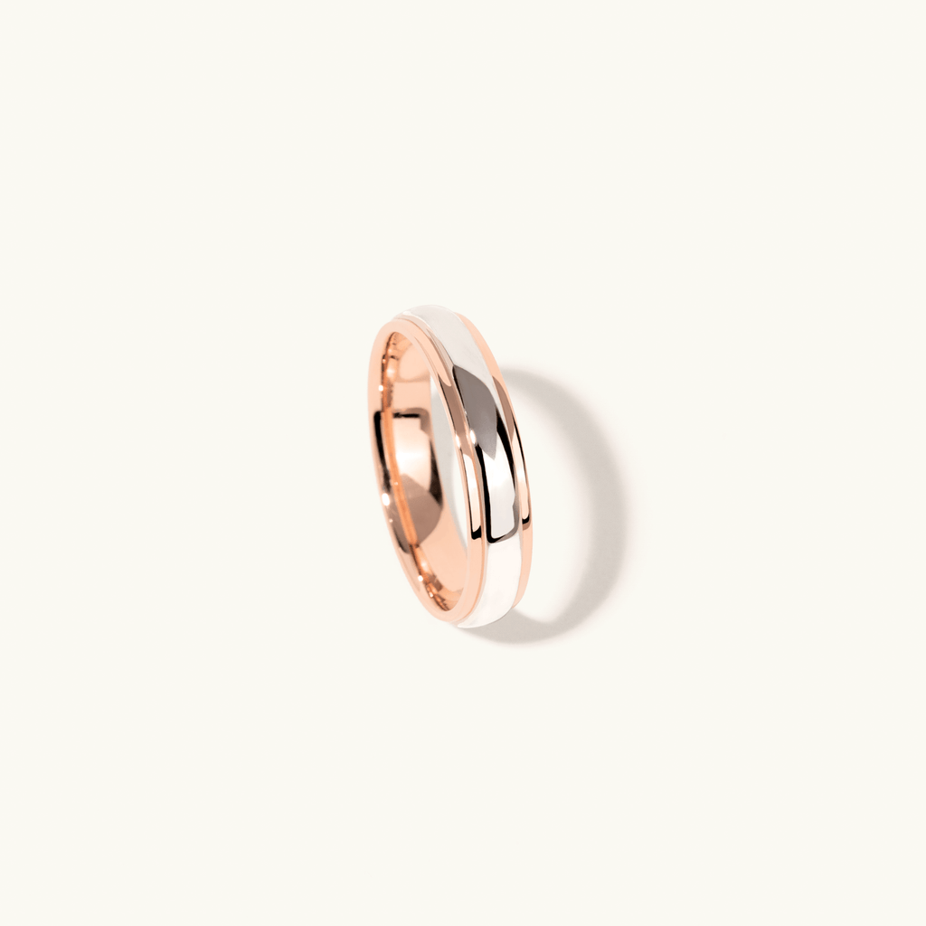 Profile view of Jewellers District's Two-Tone Beveled Wedding Ring in 14k Rose Gold, Band: 5mm