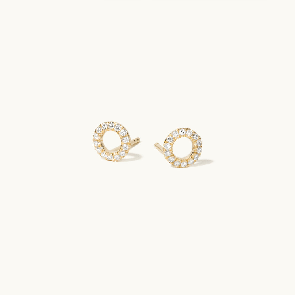 Angled view of Jewellers District's Open-Circle Diamond Pavé Studs in 14k Yellow Gold