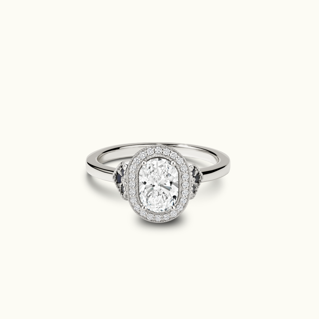 Jewellers District's Diamond Halo Engagement Ring with Side Diamonds and Milgrain in 14k White Gold, Oval