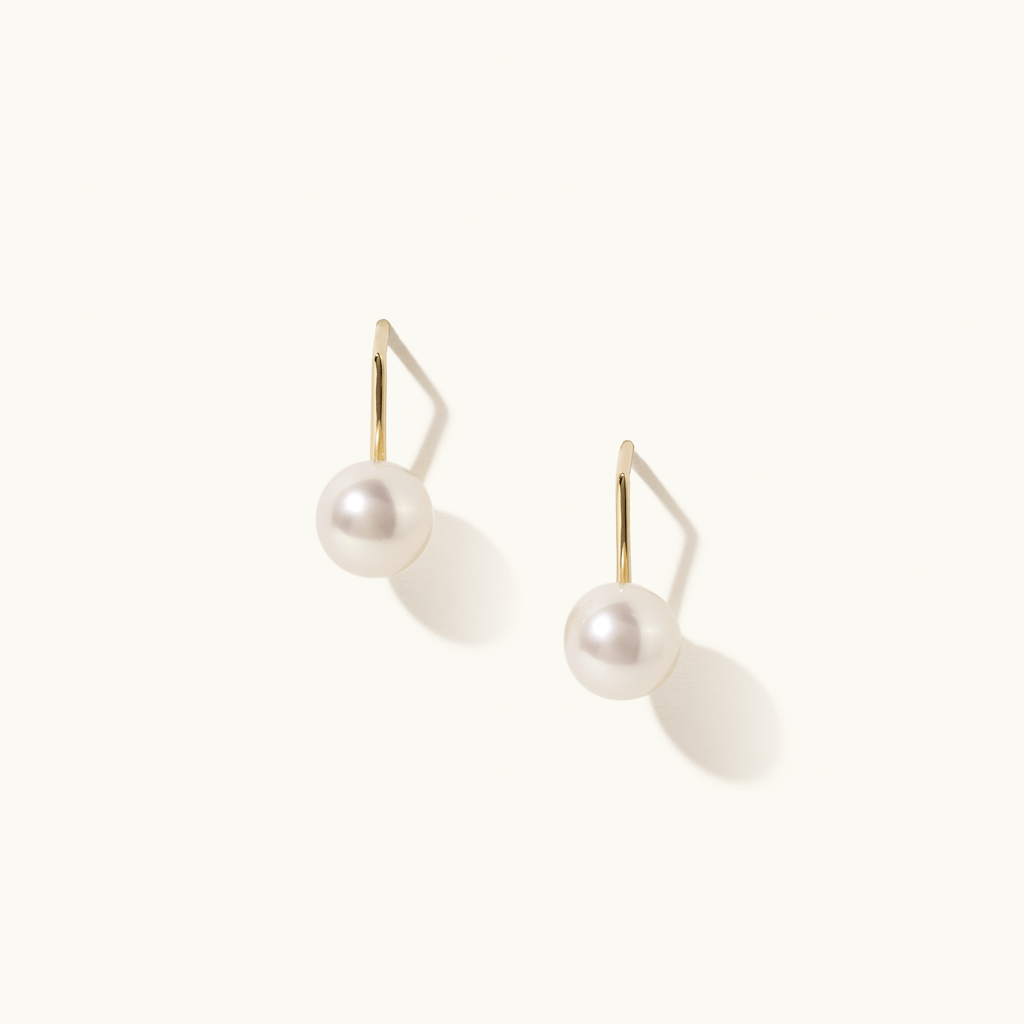 Face view of Jewellers District's Freshwater Pearl Drop Earrings in 14k Yellow Gold