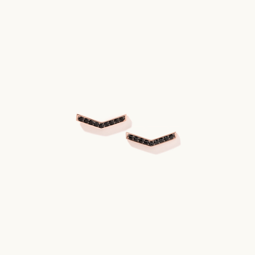 Face view of Jewellers District's V-Shaped Stud Earrings with Accent Black Spinels in 14k Rose Gold