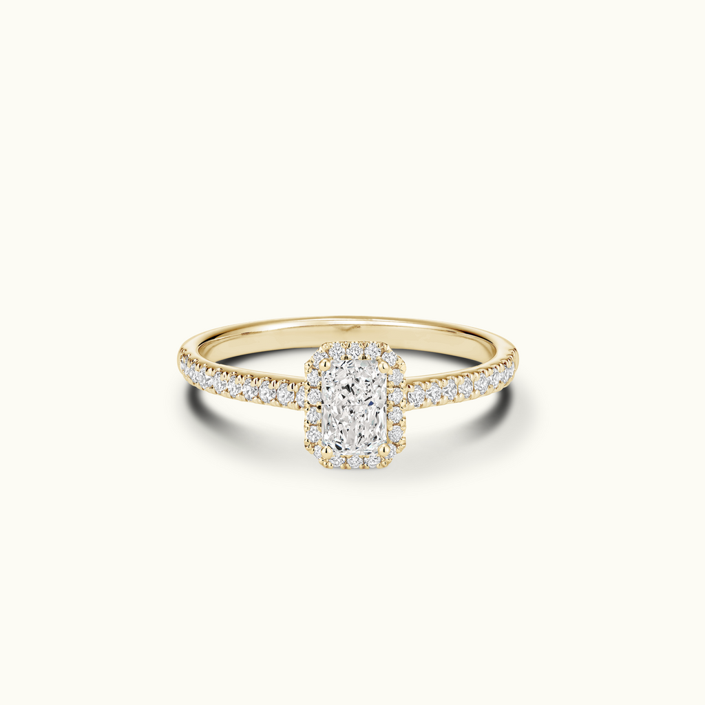 Jewellers District's Diamond Halo Engagement Ring with Diamond Bridge in 14k Yellow Gold, Radiant