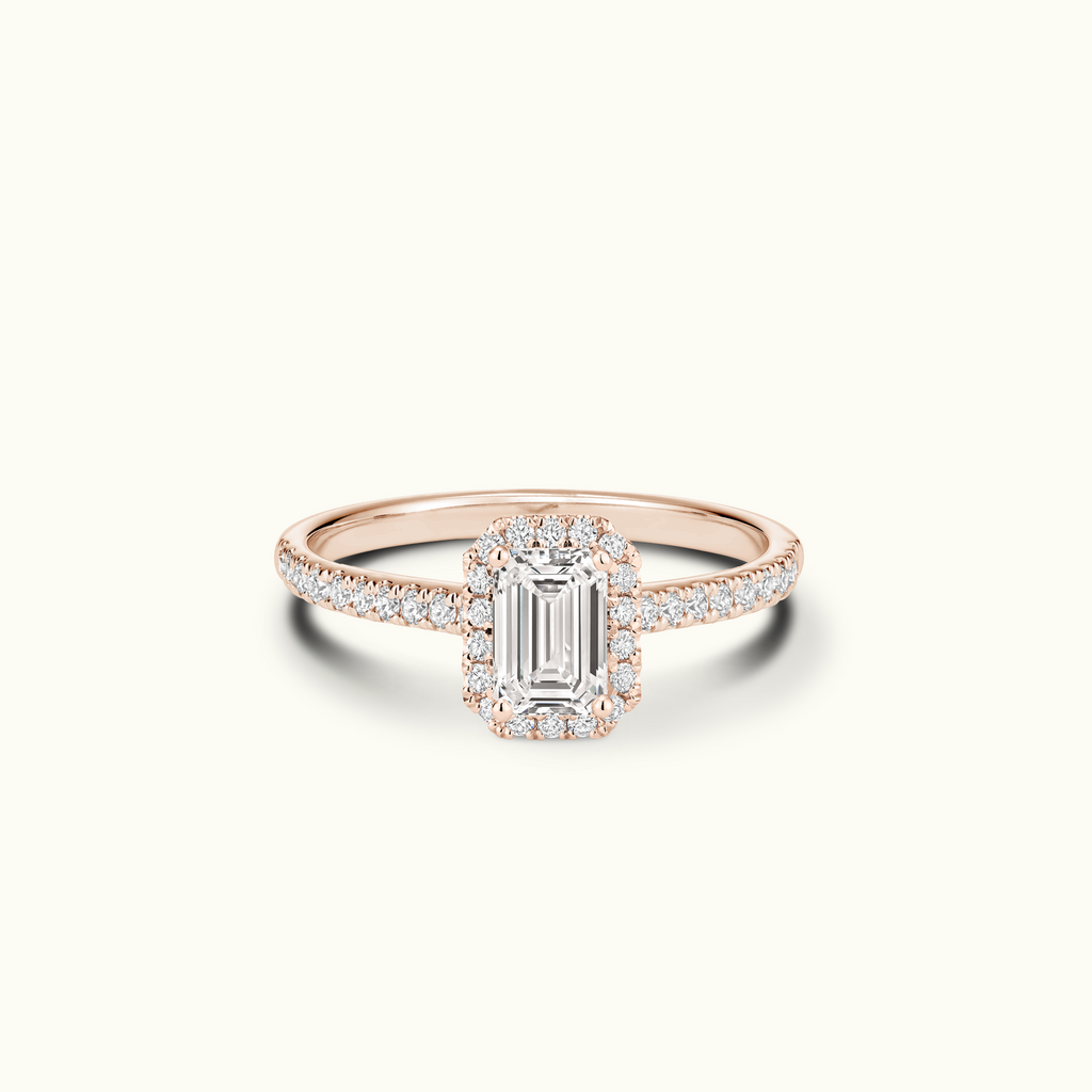 Jewellers District's Diamond Halo Engagement Ring with Diamond Bridge in 14k Rose Gold, Emerald