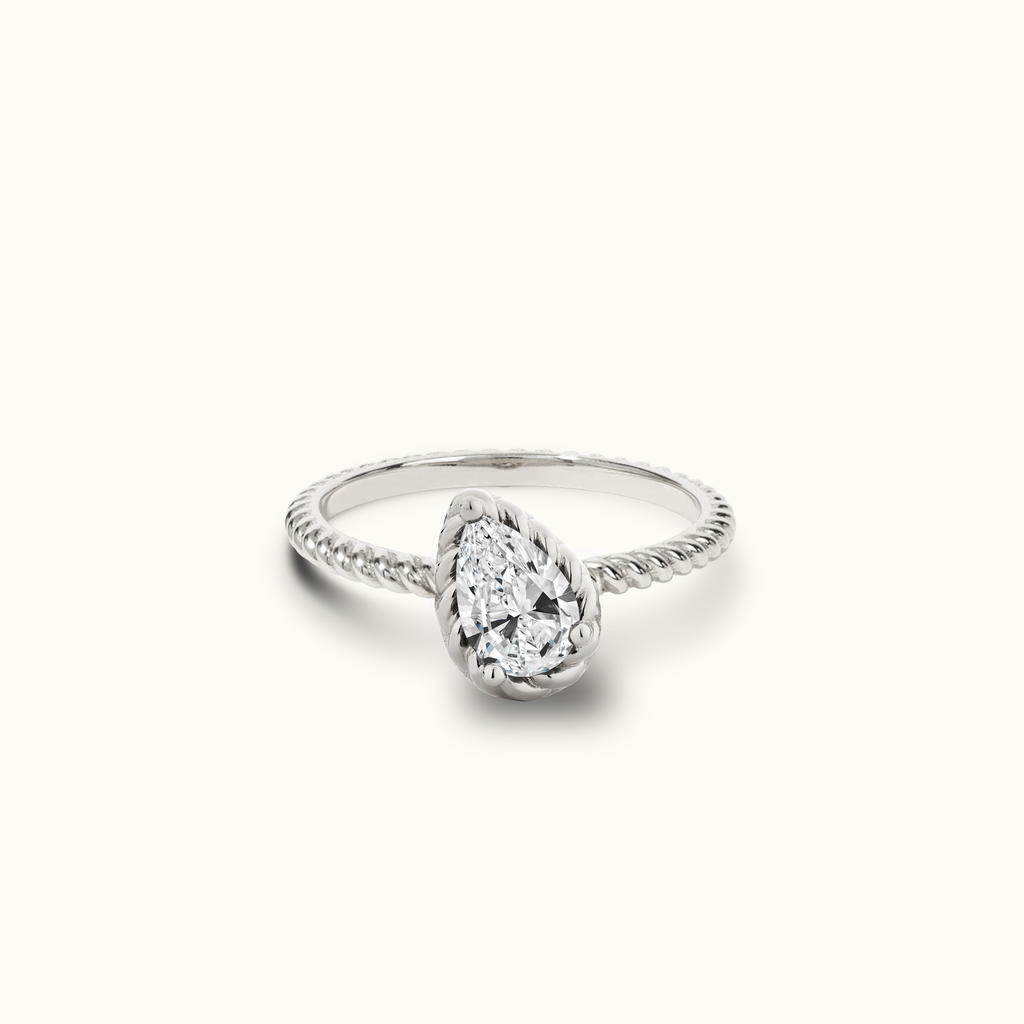 Jewellers District's Tilted Pear Cut Twist Diamond Engagement Ring in 14k White Gold, Pear