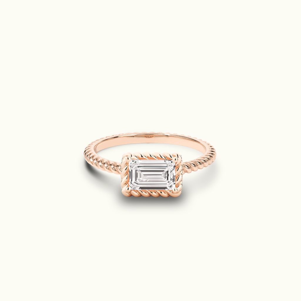 Jewellers District's East-West Twist Diamond Engagement Ring in 14k Rose Gold, Emerald