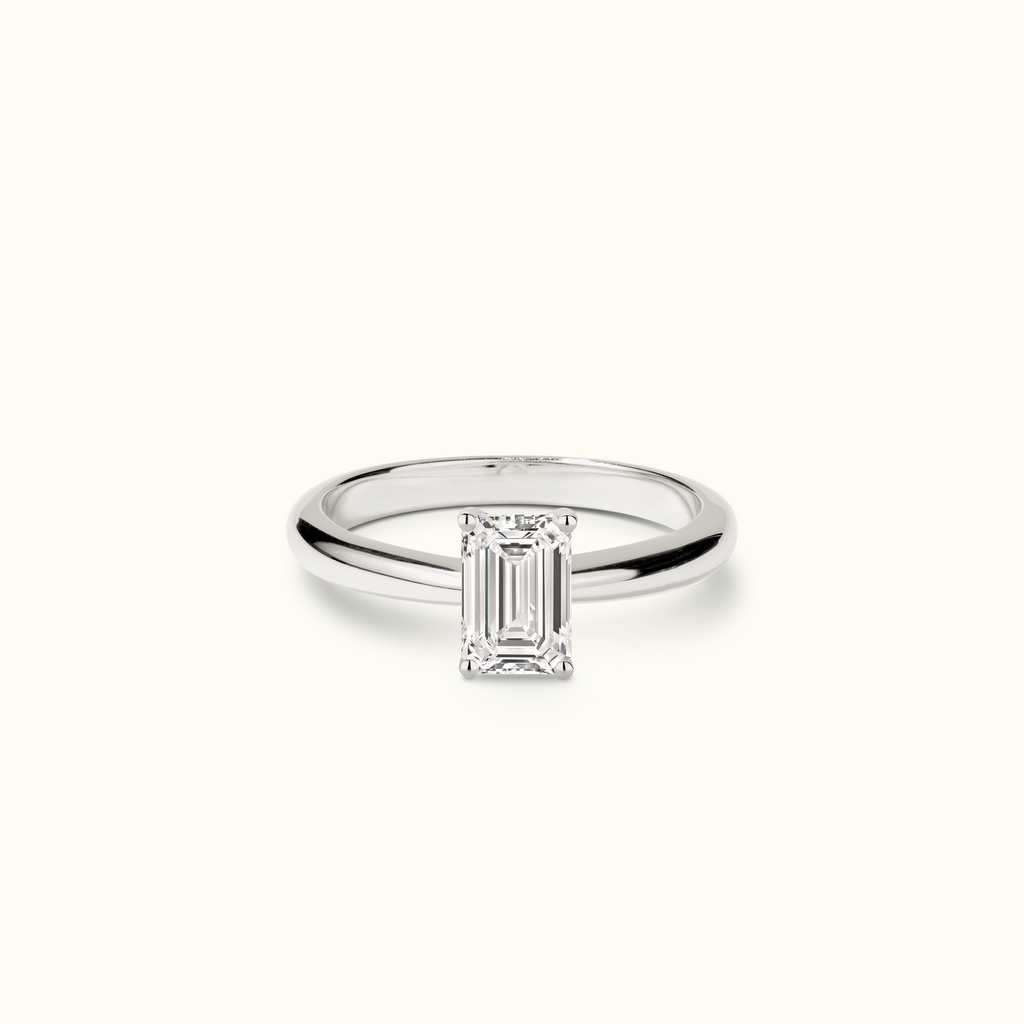 Jewellers District's Diamond Engagement Ring with Tapered Band in 14k White Gold, Emerald