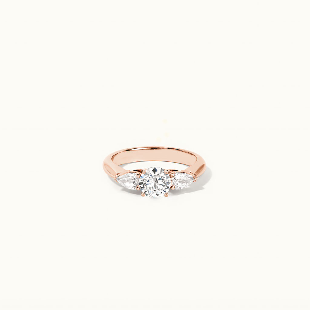 Jewellers District's Three-Stone Diamond Engagement Ring with Cathedral Setting in 14k Rose Gold, Round