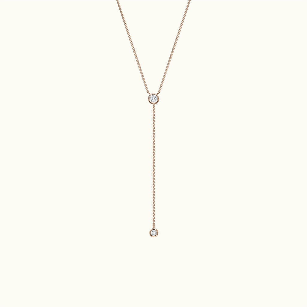 Face view of Jewellers District's Bezel-Set Round Diamonds Lariat Necklace in 14k Rose Gold