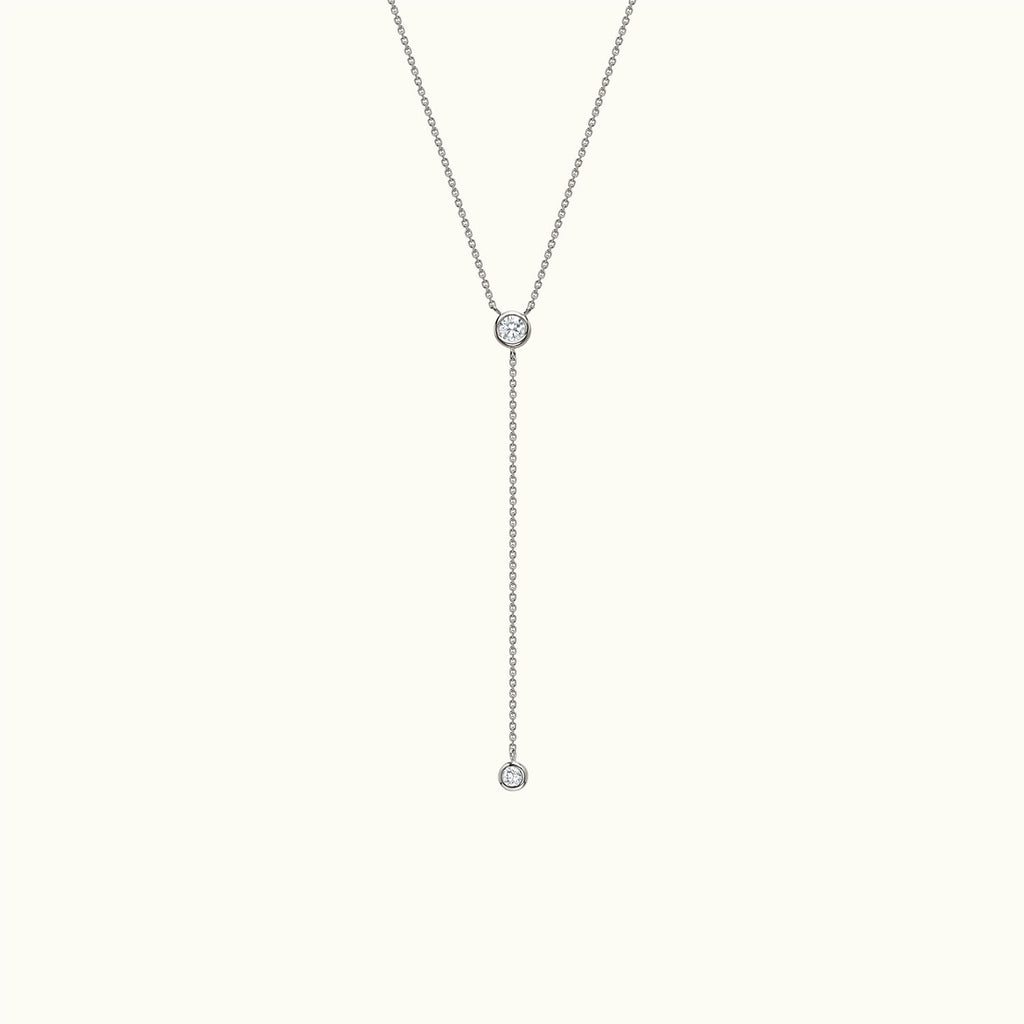 Face view of Jewellers District's Bezel-Set Round Diamonds Lariat Necklace in 14k White Gold