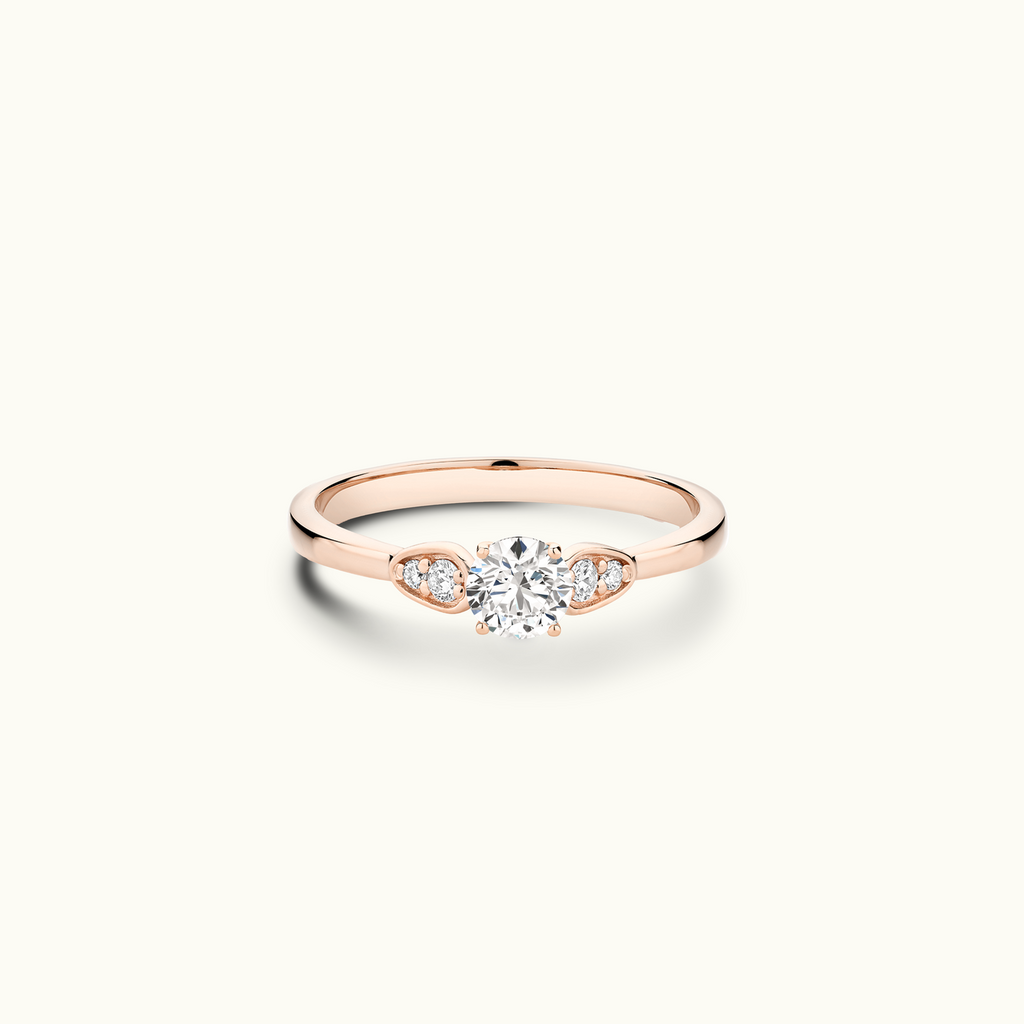 Jewellers District's Diamond Engagement Ring with Side Stone Detail in 14k Rose Gold, Round