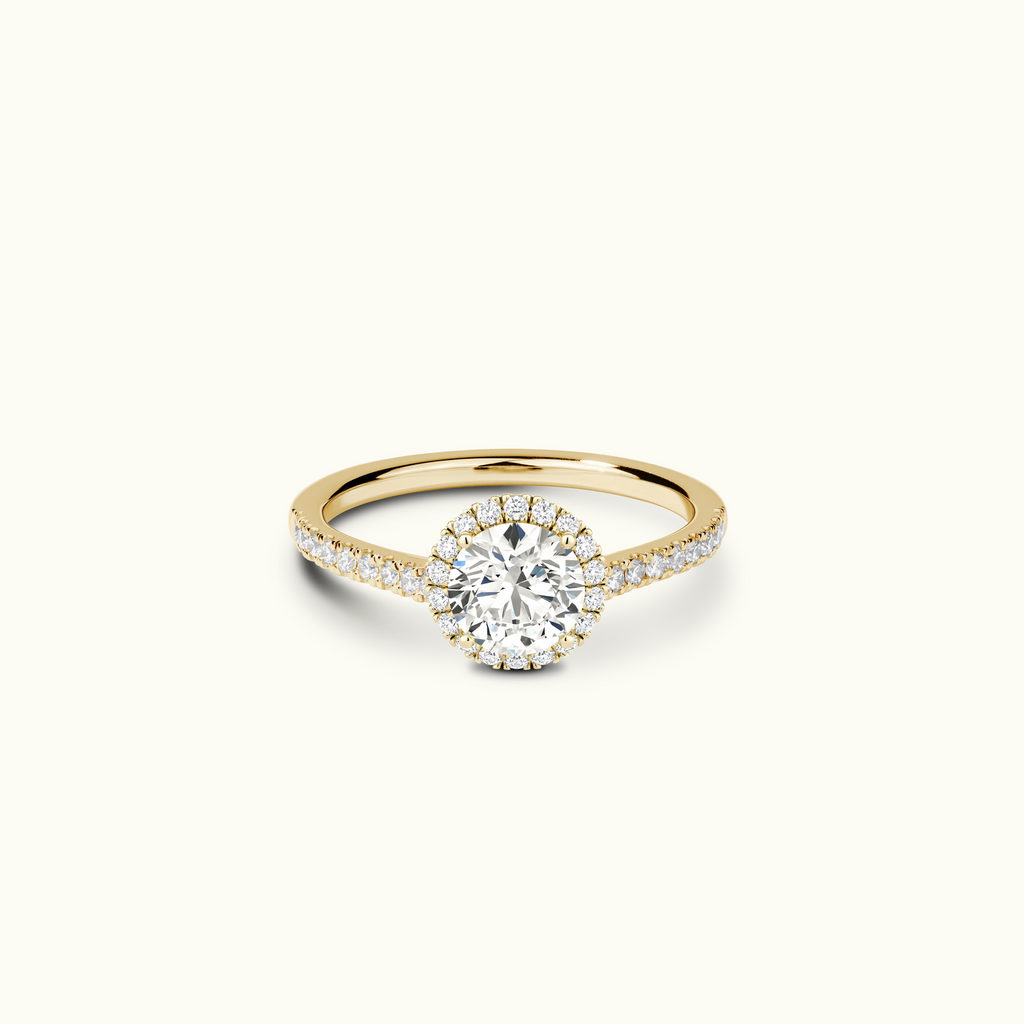 Jewellers District's Blooming Diamond Halo Engagement Ring with Accent Diamond in 14k Yellow Gold, Round