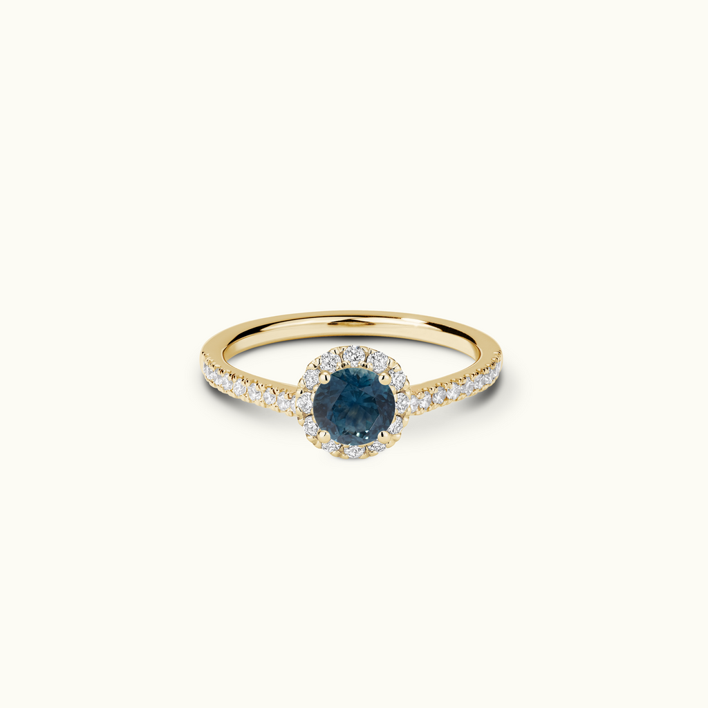 Jewellers District's Blooming Australian Sapphire Halo Engagement Ring with Accent Diamond in 14k Yellow Gold, Round