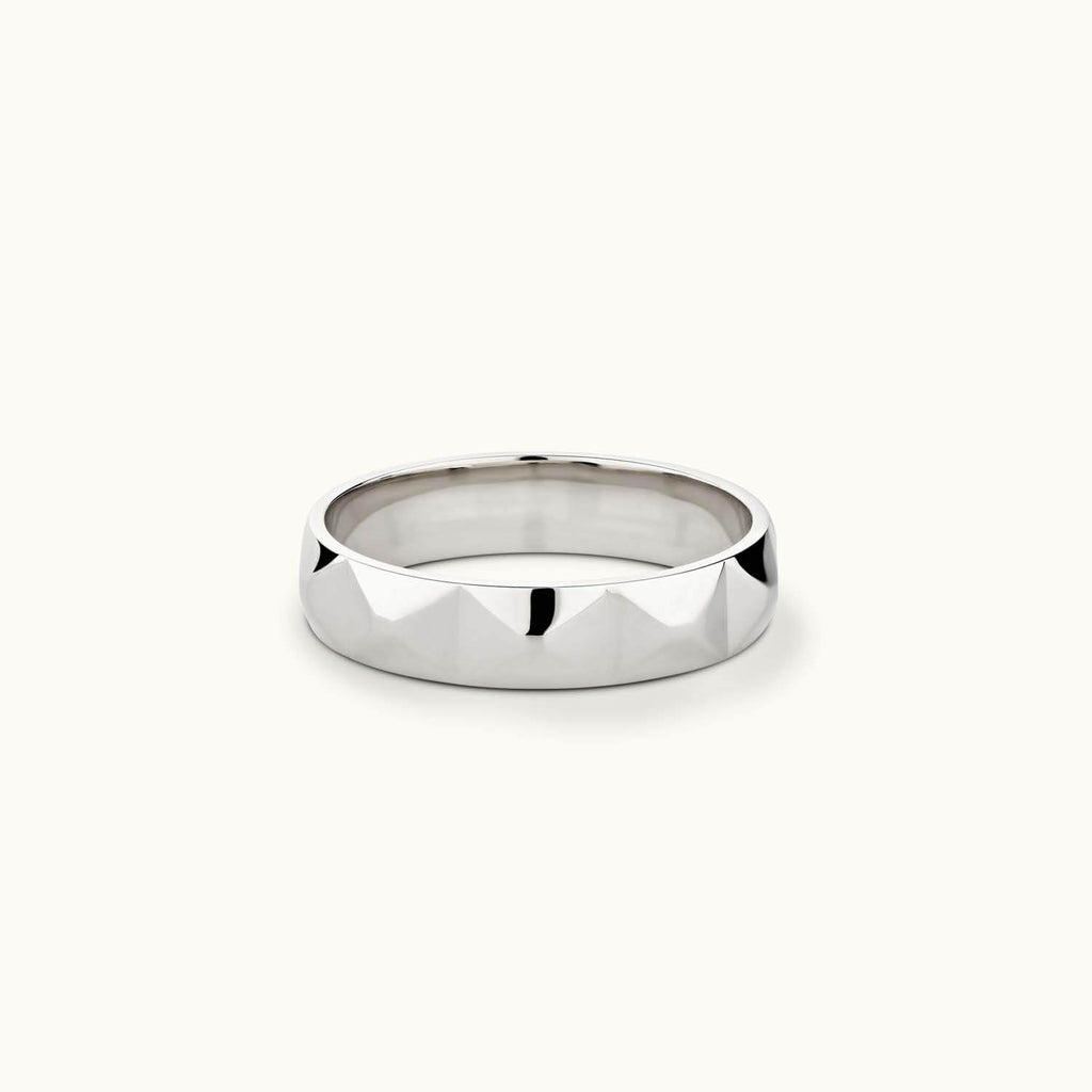 Face view of Jewellers District's Faceted Wedding Ring in 14k White Gold