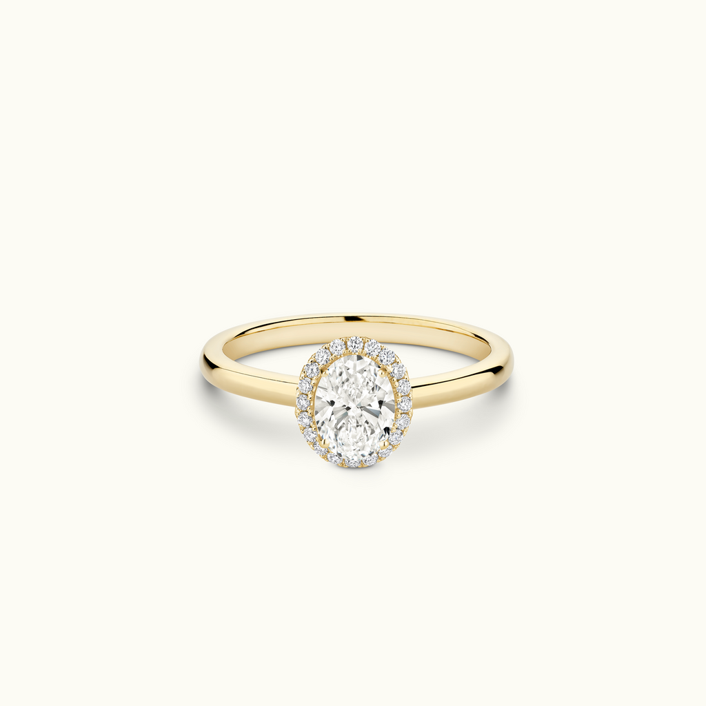 Jewellers District's Cathedral-Setting Diamond Halo Engagement Ring in 14k Yellow Gold, Oval