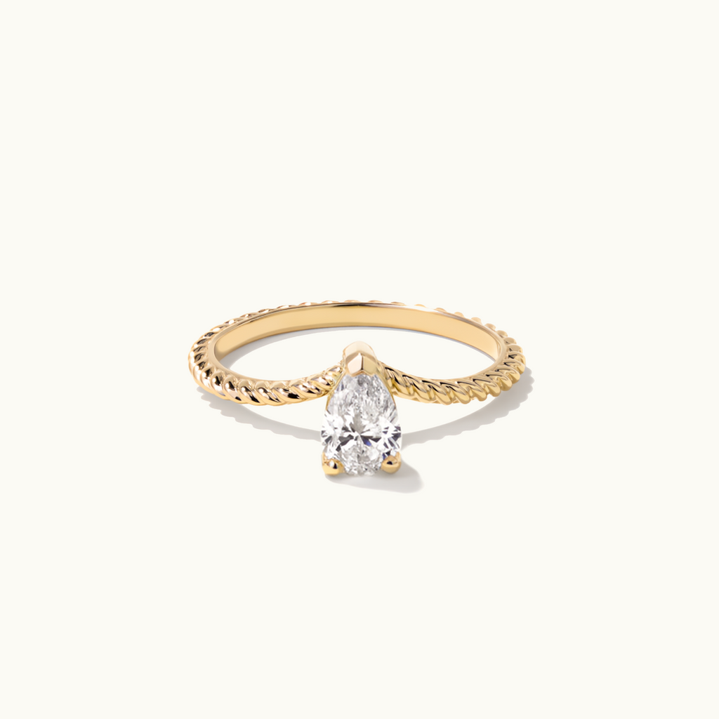 Jewellers District's V-Shaped Pear Cut Twist Diamond Engagement Ring in 14k Yellow Gold, Pear