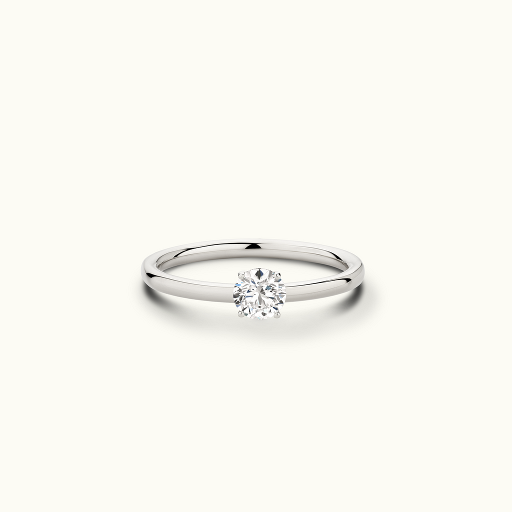 Jewellers District's Solitaire Diamond Engagement Ring with Signature Knot-Basket in 14k White Gold, Round