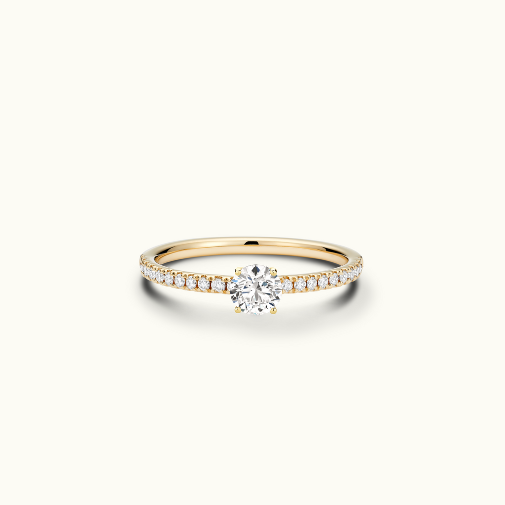 Jewellers District's Diamond Engagement Ring with Signature Knot-Basket and Diamond Band in 14k Yellow Gold, Round