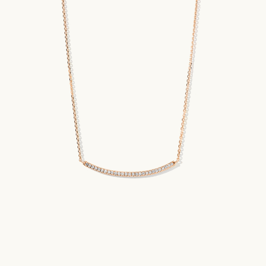 Face view of Jewellers District's Curved Diamond Bar Necklace in 14k Rose Gold