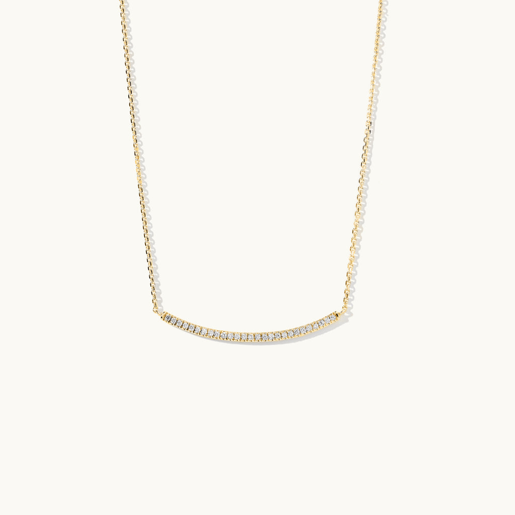 Face view of Jewellers District's Curved Diamond Bar Necklace in 14k Yellow Gold