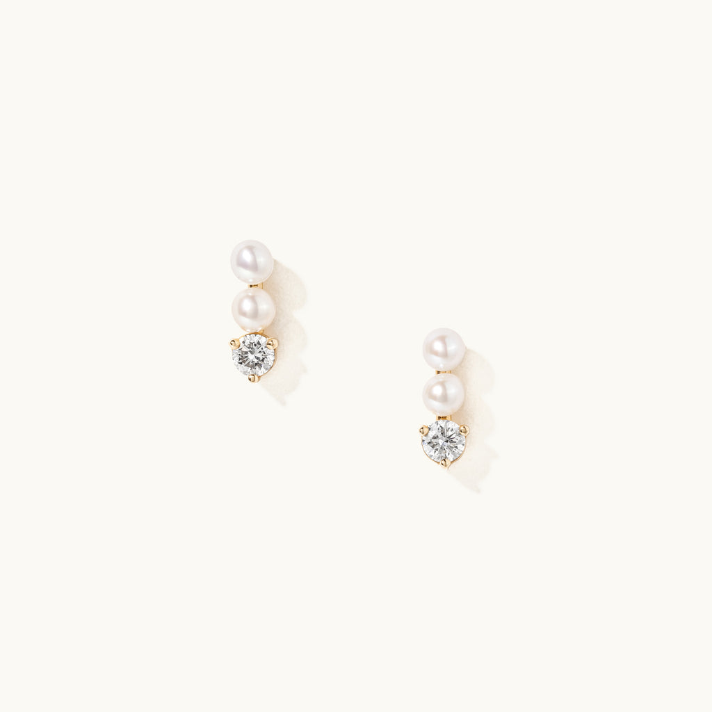 Face view of Jewellers District's Three-Stone Pearl and Diamond Bar Earrings in 14k Yellow Gold