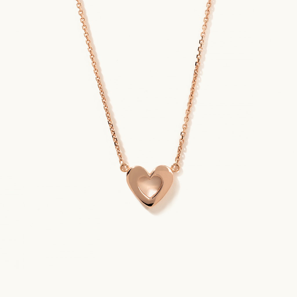 Face view of Jewellers District's Gold Heart Pendant Necklace in 14k Rose Gold