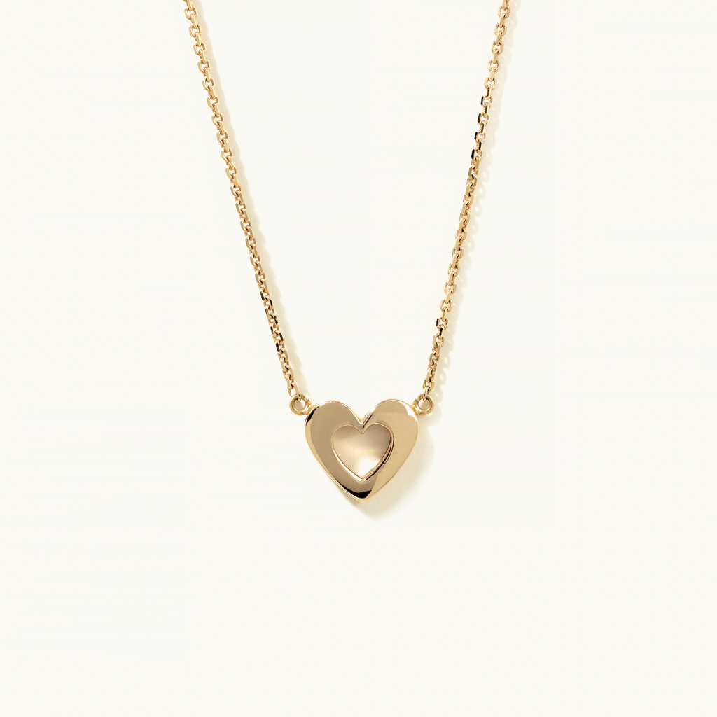 Face view of Jewellers District's Gold Heart Pendant Necklace in 14k Yellow Gold