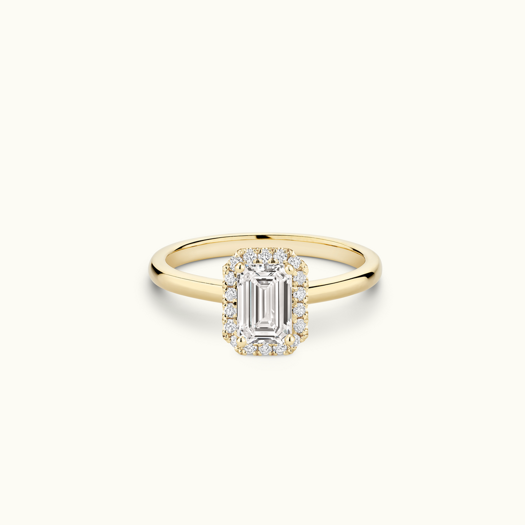 Jewellers District's Cathedral-Setting Diamond Halo Engagement Ring in 14k Yellow Gold, Emerald