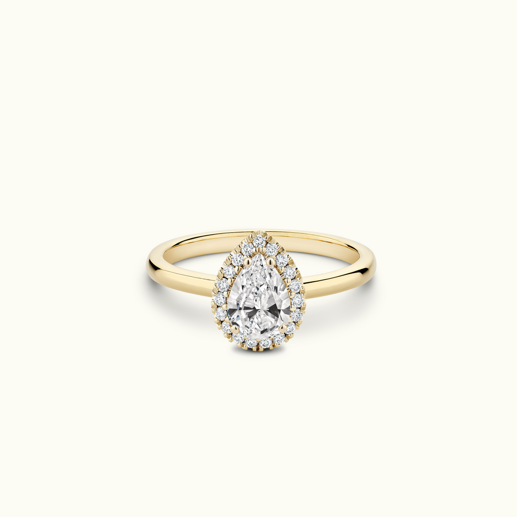 Jewellers District's Cathedral-Setting Diamond Halo Engagement Ring in 14k Yellow Gold, Pear