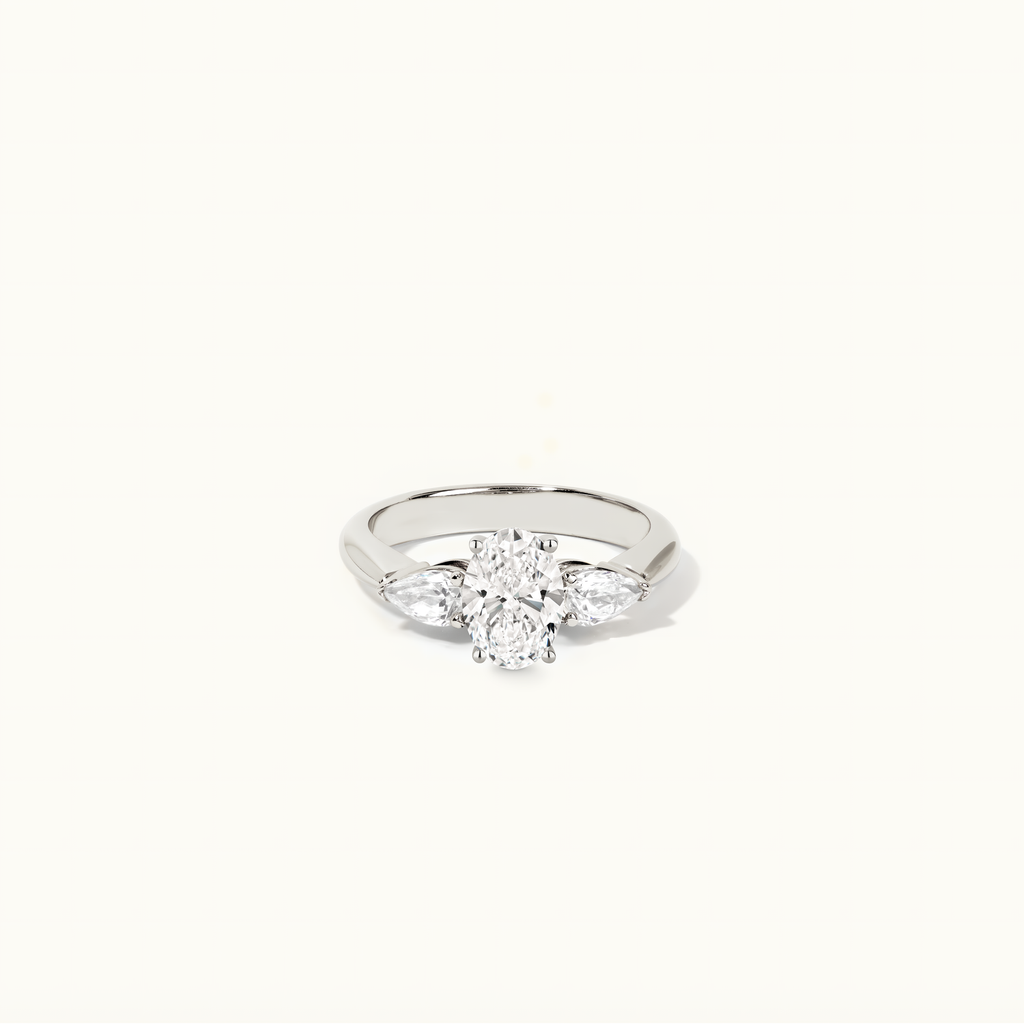 Jewellers District's Three-Stone Diamond Engagement Ring with Side Pear Diamonds in 14k White Gold, Oval