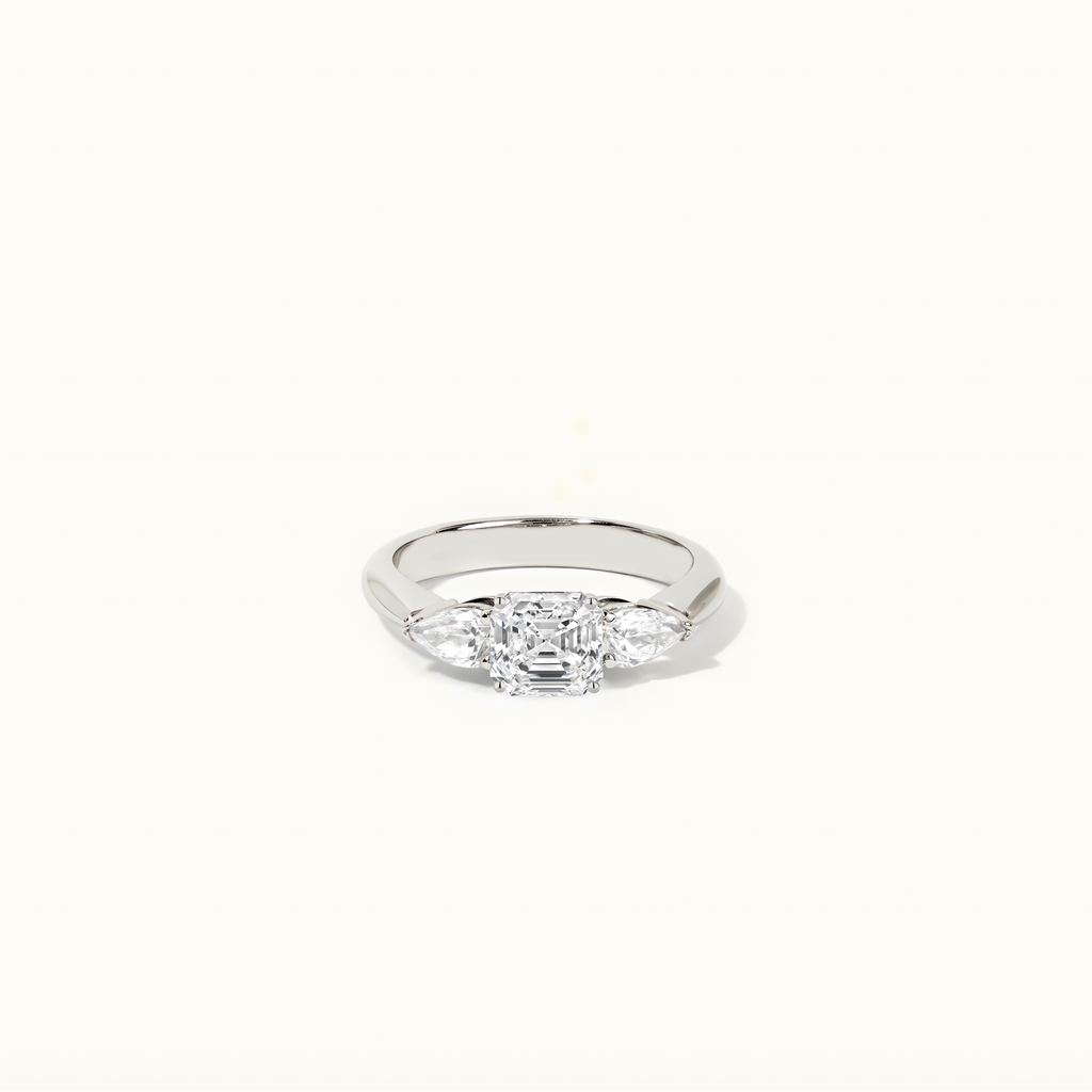 Jewellers District's Three-Stone Diamond Engagement Ring with Side Pear Diamonds in 14k White Gold, Asscher