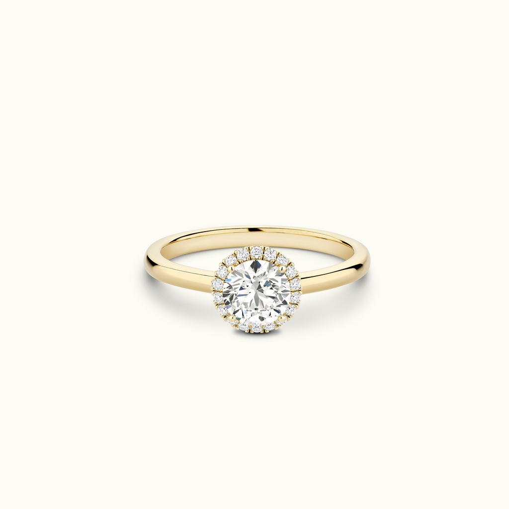 Jewellers District's Cathedral-Setting Diamond Halo Engagement Ring in 14k Yellow Gold, Round