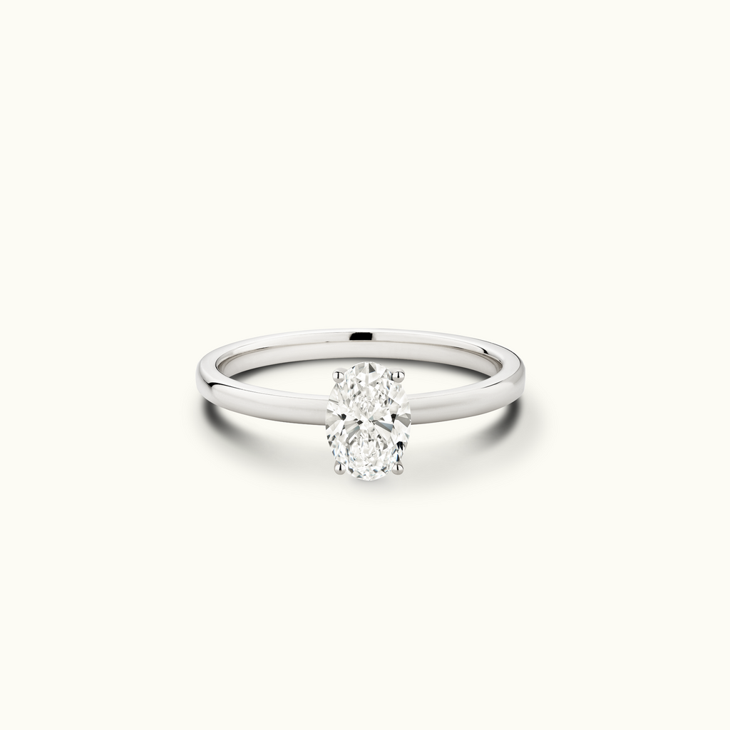 Jewellers District's Diamond Engagement Ring with Signature Knot-Basket and Accent Diamonds in 14k White Gold, Oval