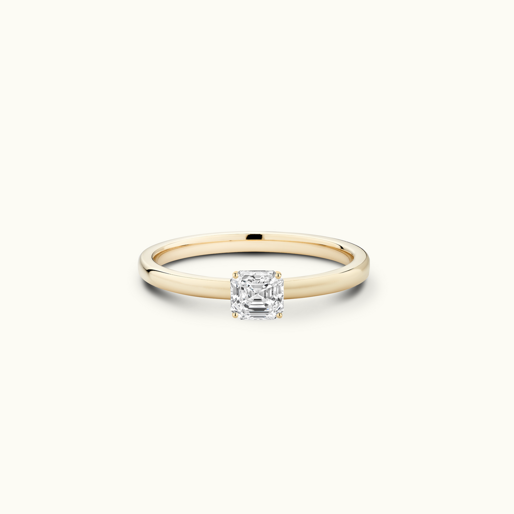 Jewellers District's Diamond Engagement Ring with Signature Knot-Basket and Accent Diamonds in 14k Yellow Gold, Asscher