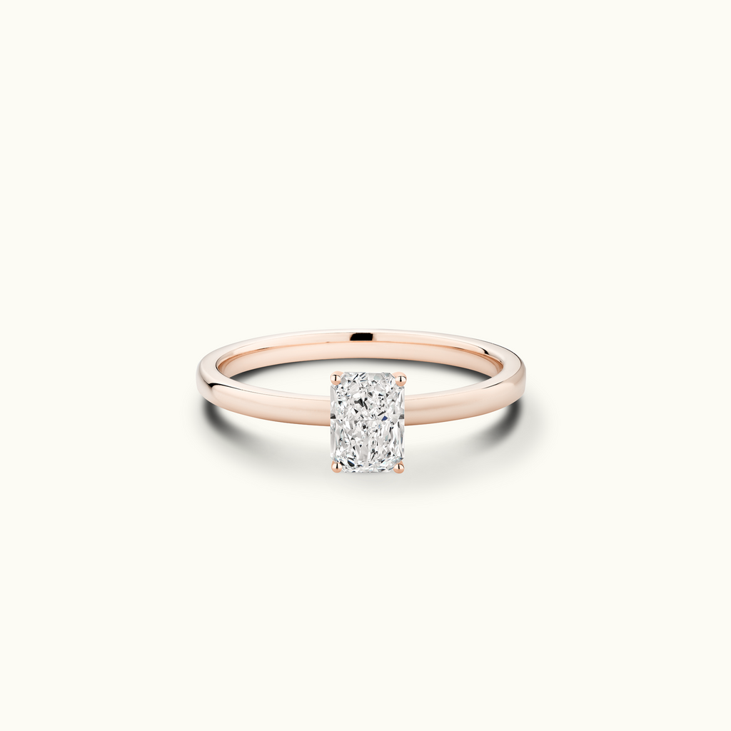 Jewellers District's Diamond Engagement Ring with Signature Knot-Basket and Accent Diamonds in 14k Rose Gold, Radiant