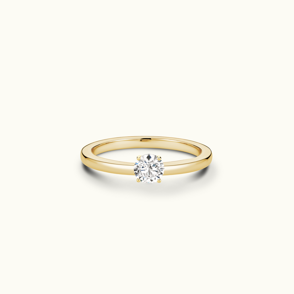 Jewellers District's Diamond Engagement Ring with Signature Knot-Basket and Diamond Prongs in 14k Yellow Gold, Round