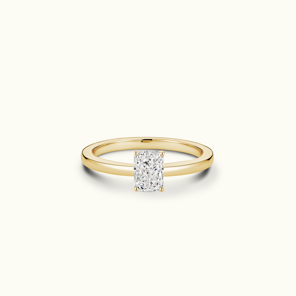 Jewellers District's Diamond Engagement Ring with Signature Knot-Basket and Diamond Prongs in 14k Yellow Gold, Radiant